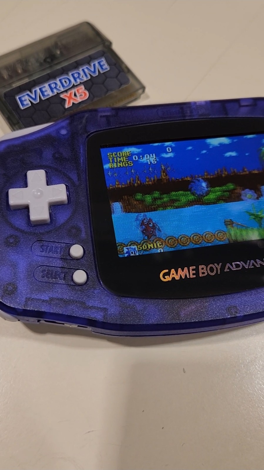 Purple Game Boy Advance with ips screen and everdrive x5