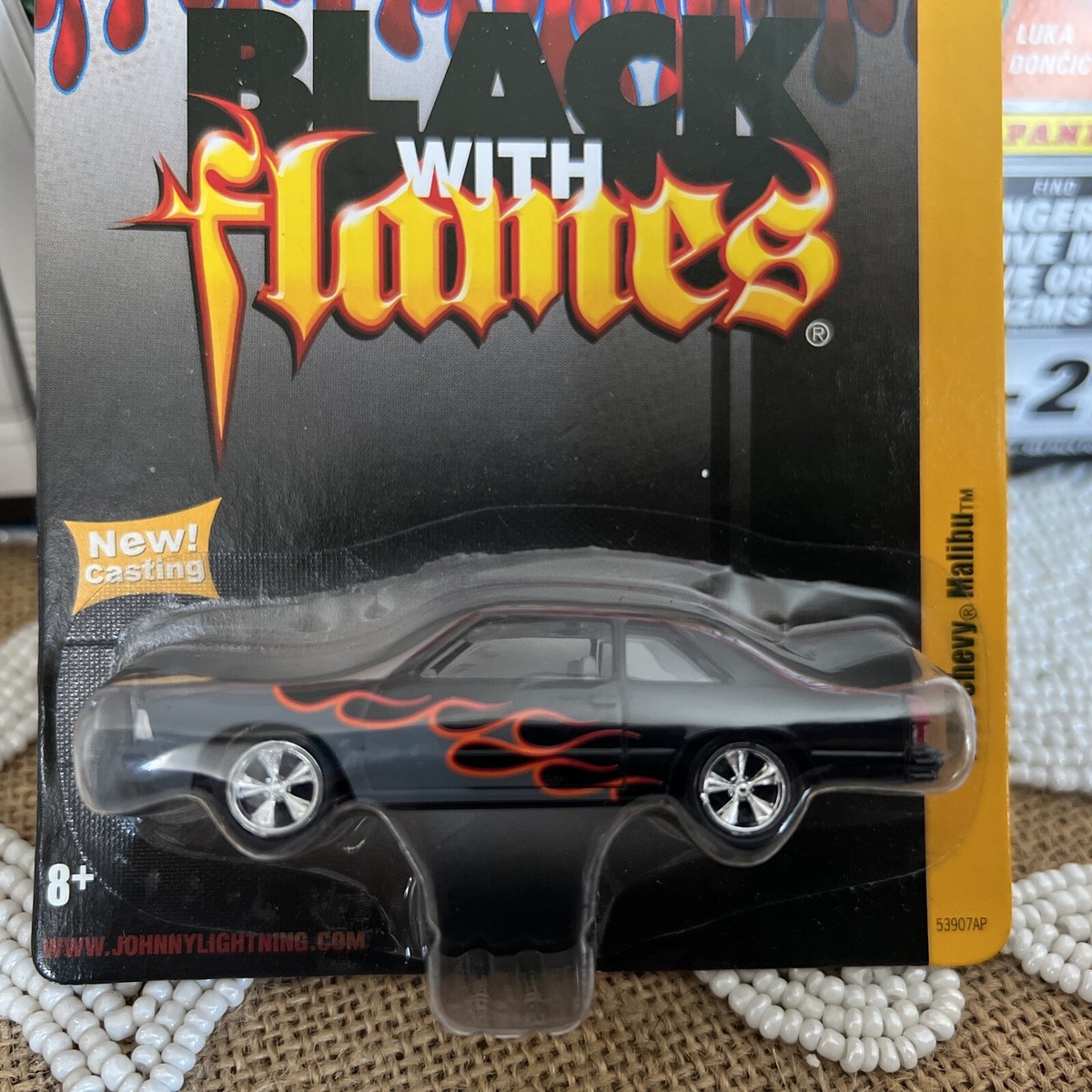 Johnny Lightning FOREVER 64 R2 BLACK WITH FLAMES 1980 Chevy MALIBU