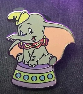 Disney Store Pin Dumbo Sitting on a Puprle and Green Circus Podium P+P 89254
