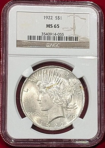 1922 PEACE SILVER DOLLAR GRADED AN MS65 BY NGC WITH LIGHTED KEEPSAKE BOX