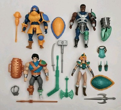 Loose lot of 4 MOTU X TMNT Man-at-Arms Teela Clamp Champ Casey Jones figures