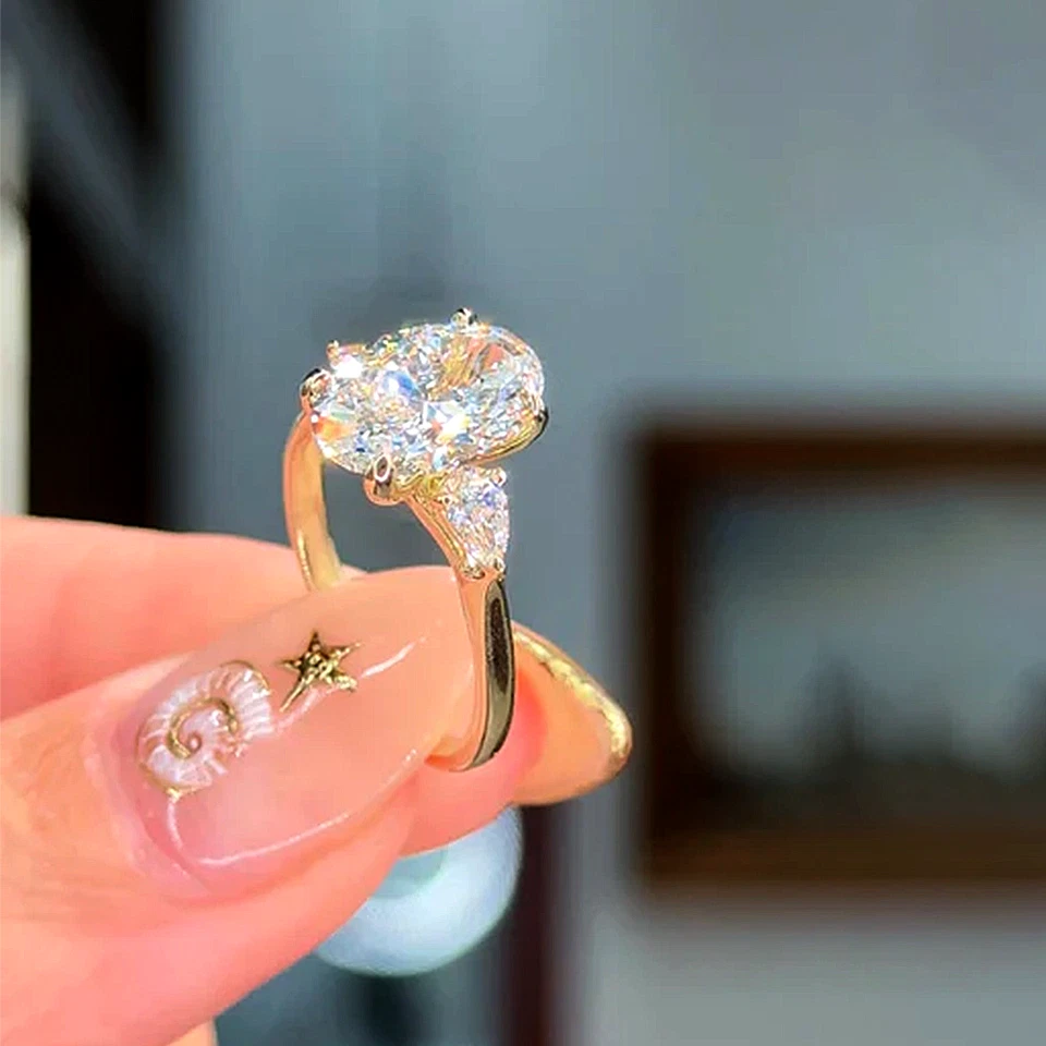 Anillo de boda de diamantes de oro amarillo de 14 quilates corte ovalado IGI 2,40 quilates tamaño 6 7 cultivado en laboratorio Foto 3 de 4