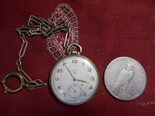 Elgin 10s 15J pocket watch with antique chain watch does not work overwound