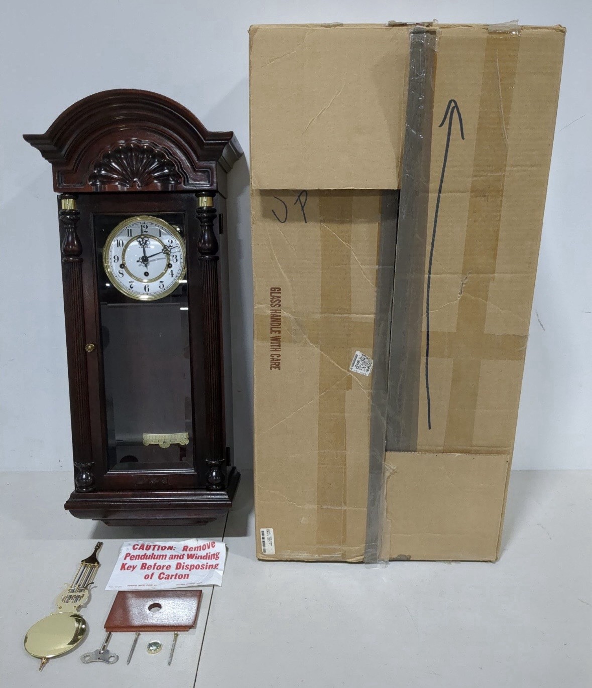 Howard Miller Jennison Wall Clock 612-221. Good Condition! Runs Chimes Perfectly
