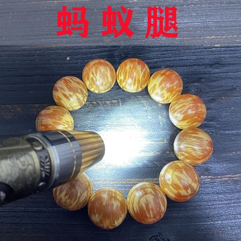 Pulsera de cuentas de madera ámbar grano de pierna de hormiga madera de agar cuentas de pino joyería translúcida Foto 3 de 4