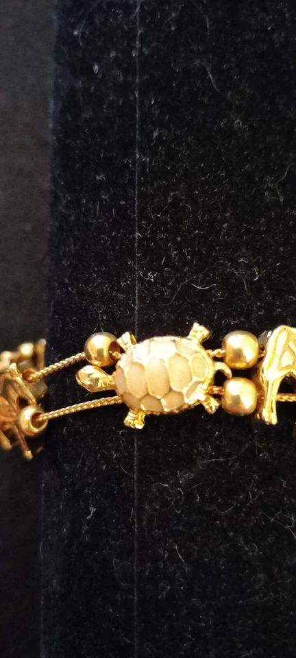 Impresionante y Adorable Pulsera Dije Animal Tono Dorado AVON con Piedra Dorada Rosa/Melocotón Foto 4 de 4