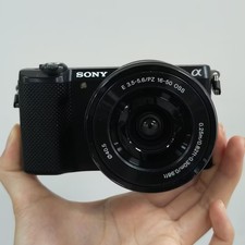 Sony Alpha A5000 w/16-50mm lens Mirrorless Camera 20.1MP Tiltable Screen- Black
