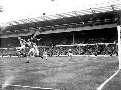 Wimbledons Roy Law heads clear from Sutton Uniteds Trevor Bladon D- Old Photo