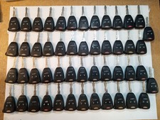 LOT OF 50 OEM CHRYSLER-FAMILY REMOTE HEAD KEY...