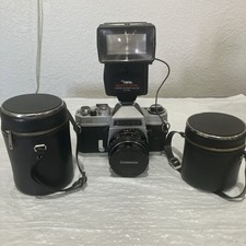 Chinon CS 35mm Camera With 3 Lenses And Flash Unit, Battery Cover Is Missing.