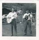 vintage snapshot photo: Men Farm Musicians Playing String Guitar Mandolin 1954 — photo 1