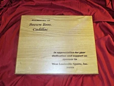  BROWN BROS. CADILLAC  AWARD PLAQUE  WEST LOU. SPORTS INC.15 X 12 X 7/8"