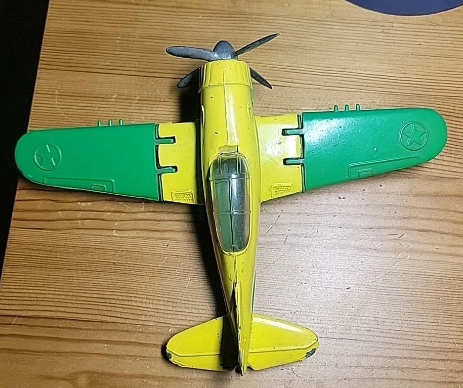 Avión fundido a presión Hubley Kiddie de colección con ruedas de alas plegables verde amarillo Foto 2 de 4