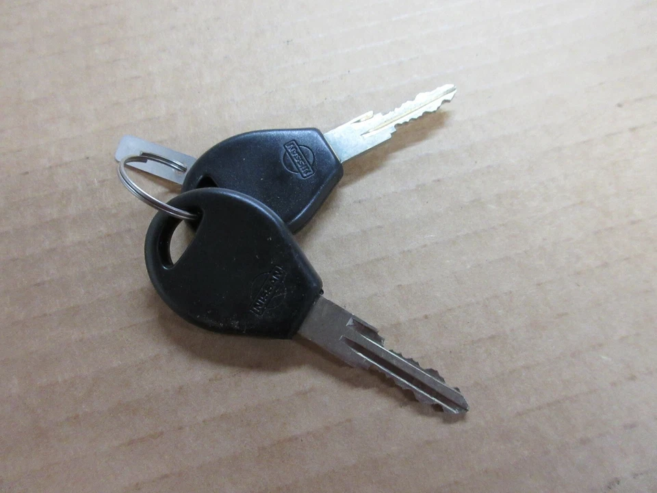 Cerradura de puerta y llave de cilindro Nissan 80601-6E326 1991-1994 Nissan Máxima NOS de colección Foto 4 de 4