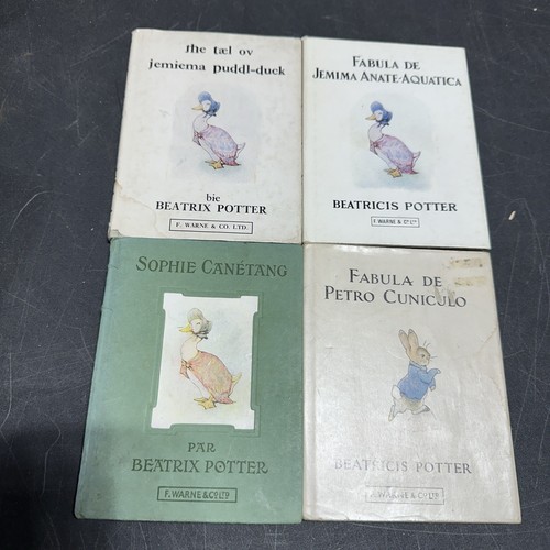 Set mit 4 Beatrix Potter Büchern. Französischer und lateinischer Peter Hase, Pfützenente.