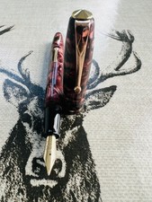 Conway Stewart 85 fountain pen, 14k gold M nib,burgundy celluloid,serviced,1950s