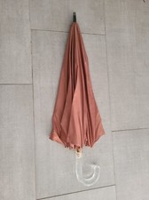 Vintage Umbrella in orange color no hole or rip 35 in when opened