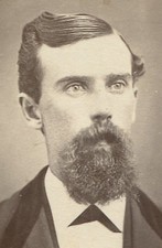 HANDSOME MAN, SLICK HAIR, THICK MUSTACHE AND CHIN BEARD. DAMARISCOTTA, MAINE. 