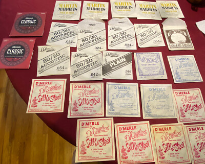 LOT OF 26 VINTAGE NOS GUITAR STRINGS MARTIN, D'MERLE, D'ANGELICO, D'ADDARIO ETC.