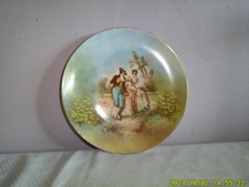 9.5-Inch Porcelain Man and Woman in the Garden Decorative Plate