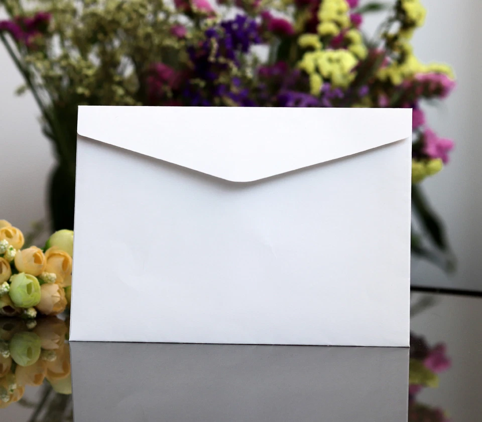 Tarjeta de invitación de boda con flor hueca cortada con láser con cinta/tarjeta de visita de hotel Foto 3 de 4