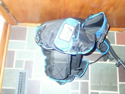 SeaPro BCD Used Size XS/S , holds air , recommend service before use.  Not weigh