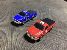 2 Red Life-Like 5 9 Ford 1:64 Slot Trucks Tested Both Run. VGC. Electric Slots