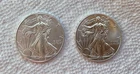 Two 1 Troy Ounce American Silver Eagles BU:  2013, 2014.