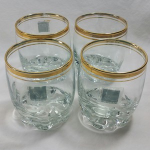 clear glasses with gold trim