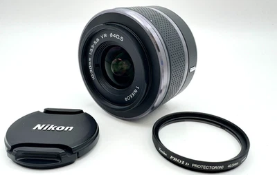 Nikon1 NIKKOR 10-30mm f/3.5-5.6 VR PD-Zoom noir presque "comme neuf" du Japon... - Photo 1/4
