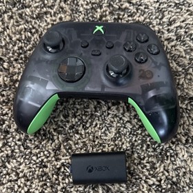 Microsoft Xbox Series X 1TB Console with two Microsoft controllers, battery pack