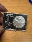 2009 $1 AMERICAN SILVER EAGLE, 1 OZ . .999