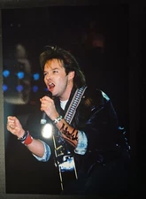 nick van Eede CUTTING CREW during a performance in the 1980;s signed 12x8 photo