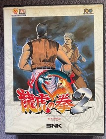 Neo Geo console, 2 controllers, 5 ROM cartridges, and 1 memory card.Tested 