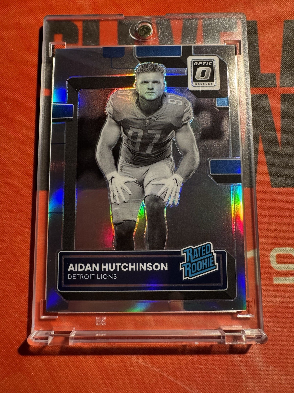 2022 Optic - Rated Rookie Aidan Hutchinson #213 Holo Prizm Variation (RC) Lions 