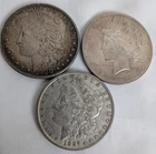 Lot of 3 Investment Circulated Morgan and Peace Silver Dollars