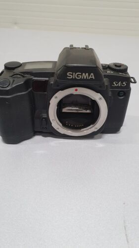 Appareil photo SIGMA SA-5 boîtier uniquement noir ne fonctionne pas pour pièces - Photo 1 sur 9