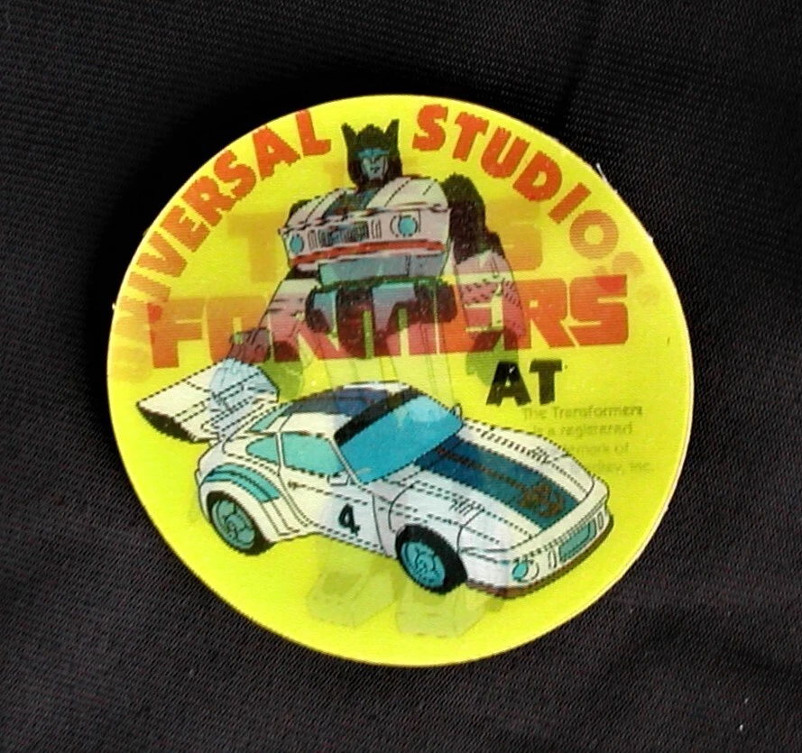 UNIVERSAL STUDIOS TRANSFORMERS Pin Back botón doble imagen de colección RARO N/M Foto 3 de 4