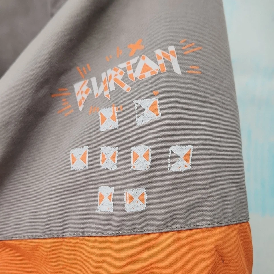 Chaqueta de esquí de snowboard gris y naranja Burton para niños Foto 3 de 4