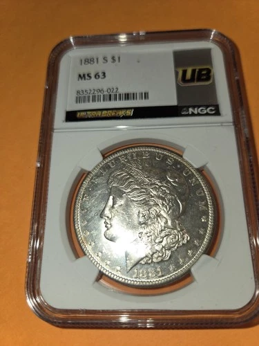 1881s MORGAN SILVER DOLLAR, MS. 63 NGC CAPSULE PRICED TO SELL COMEC.