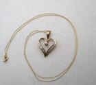 10K Yellow Gold 32 Diamond Baguette Heart Pendant Necklace 20" — photo 6