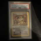 Wizards of the Coast 2000 Pokemon Team Rocket Meowth 1st Ed 62/82 PSA 9