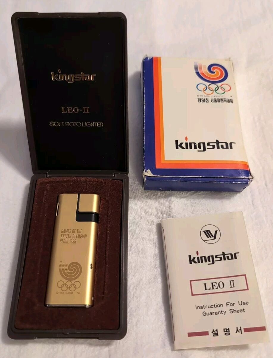 Vintage Gold Tone 1986 Olympics Kingstar Lighter . Comes Vintage Gold Tone 1986 Olympics Kingstar Lighter . Comes