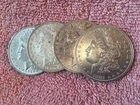 MORGAN SILVER DOLLAR COINS.  LOT OF 4  AU./ DETAILS   PRE. 1921 LOT # 3