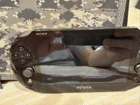 PS Vita PCH-2001 Black: 4GB With Camo Case And Mortal Kombat Loose