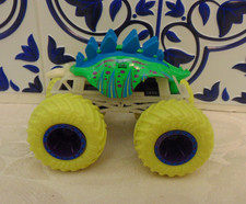 Hot Wheels Monster Jam "Motosaurus" Truck GLOWS 1:64 Scale Collectible Dinosaur