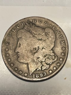 Authentic 1893 p Morgan Dollar with added “s”
