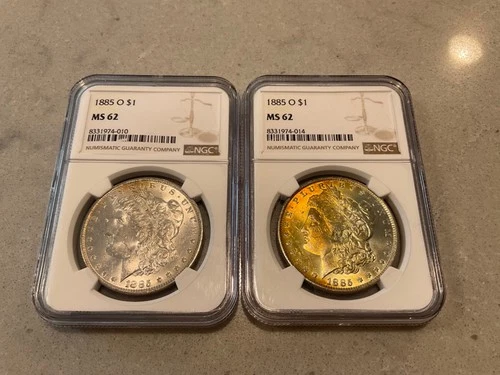 Lot 0f 2 1885 O Morgan Silver $1 NGC MS 62 toned