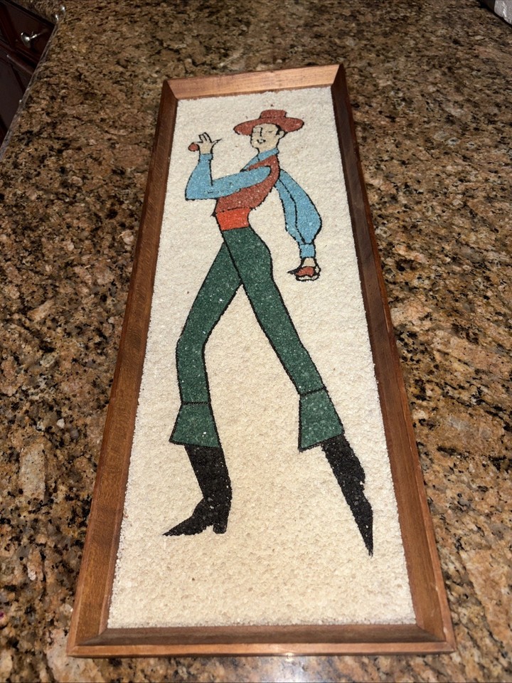 A 1960s Spanish dancer gravel art piece in a wood frame — an utterly specific, wonderfully weird slice of mid-century kitsch that's genuinely rare.