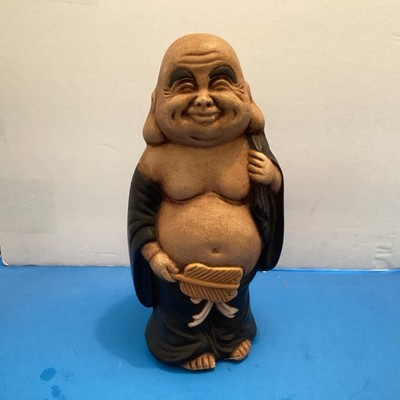 Ceramic Buddha Statue Tan Body Black Robe. A Few Small Marks Toe Nicked See Pics